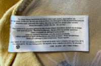 Picture of The William Carter Company Recalls Infant's Yellow Footed Fleece Pajamas with Animal Graphic Due to Puncture and Laceration Hazards