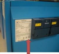 Picture of Recalled Gas Boiler with arrow indicating rating plate