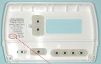 Picture of Recalled Thermostat Showing Location of Location of Date Code - Inside Front Cover
