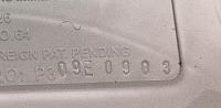 Detail of molded label showing location of date code