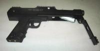 Picture of Recalled BT SA-17 paintball maker with lever to CO2 cartridge chamber open