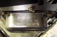Enlarged valve cover picture showing the location of model number and date code