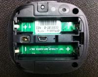 View of the recalled satellite communicator battery compartment showing the ESN label