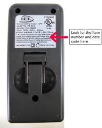 Picture of recalled Battery Charger showing location of item number and date code on label