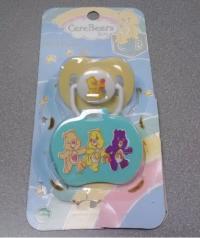 Picture of recalled pacifier and clip attachment in packaging