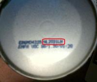 Picture of the bottom of the recalled aerosol canister showing location of batch date